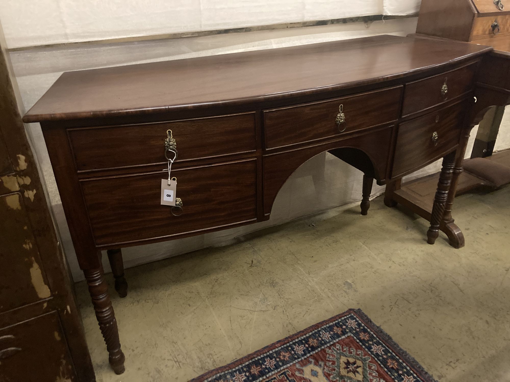 A Regency mahogany bowfront sideboard, width 145cm depth 51cm height 82cm